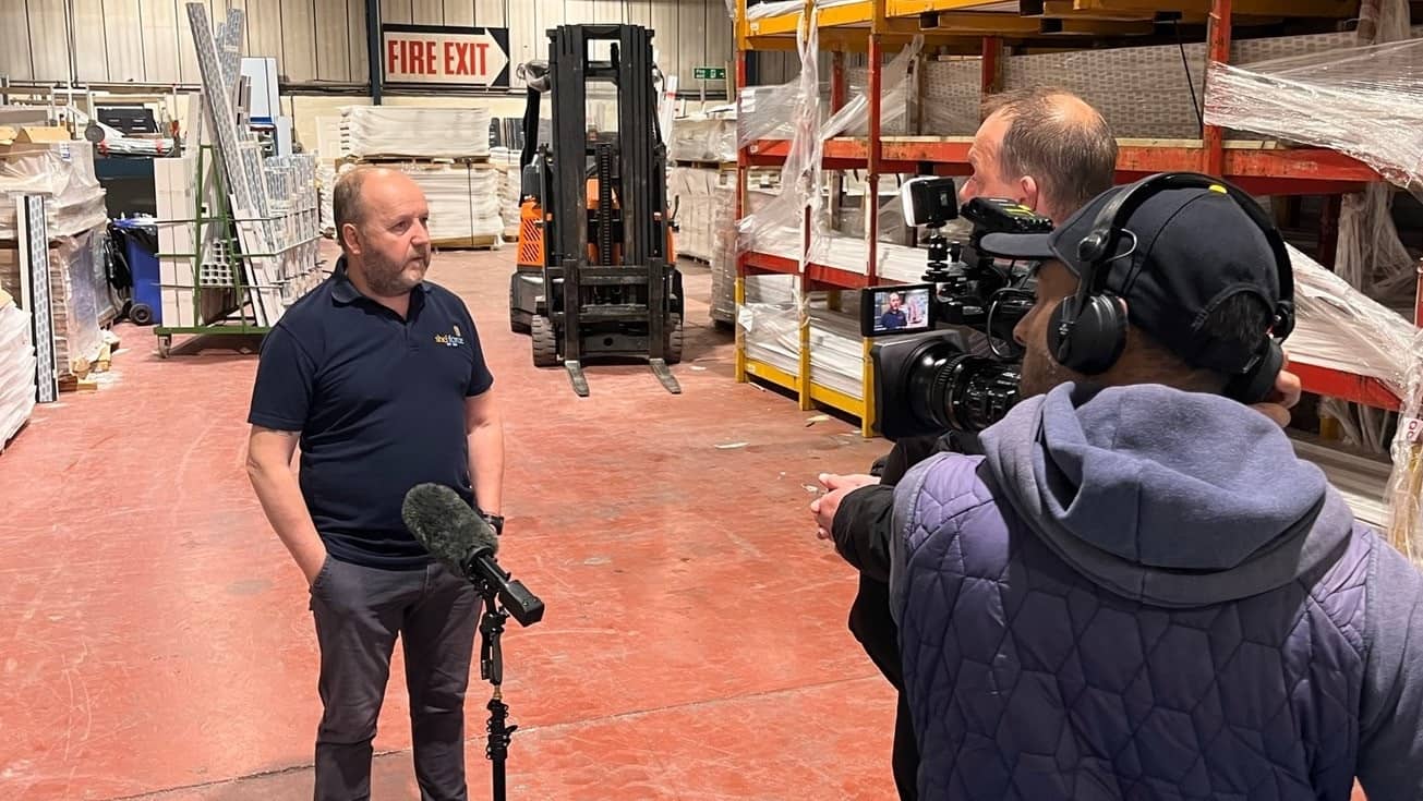Howard Trotter being interviewed by film crews