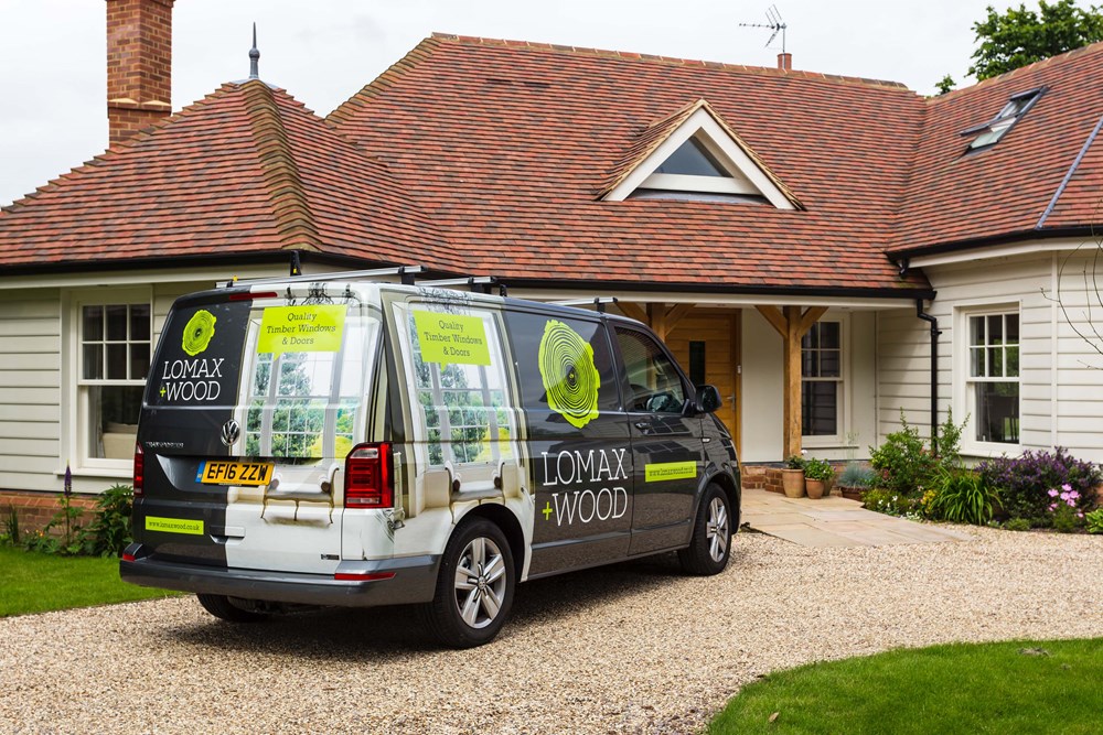 Lomax & Wood PPC Case Study image showing a branded installation van outside a timber-window property