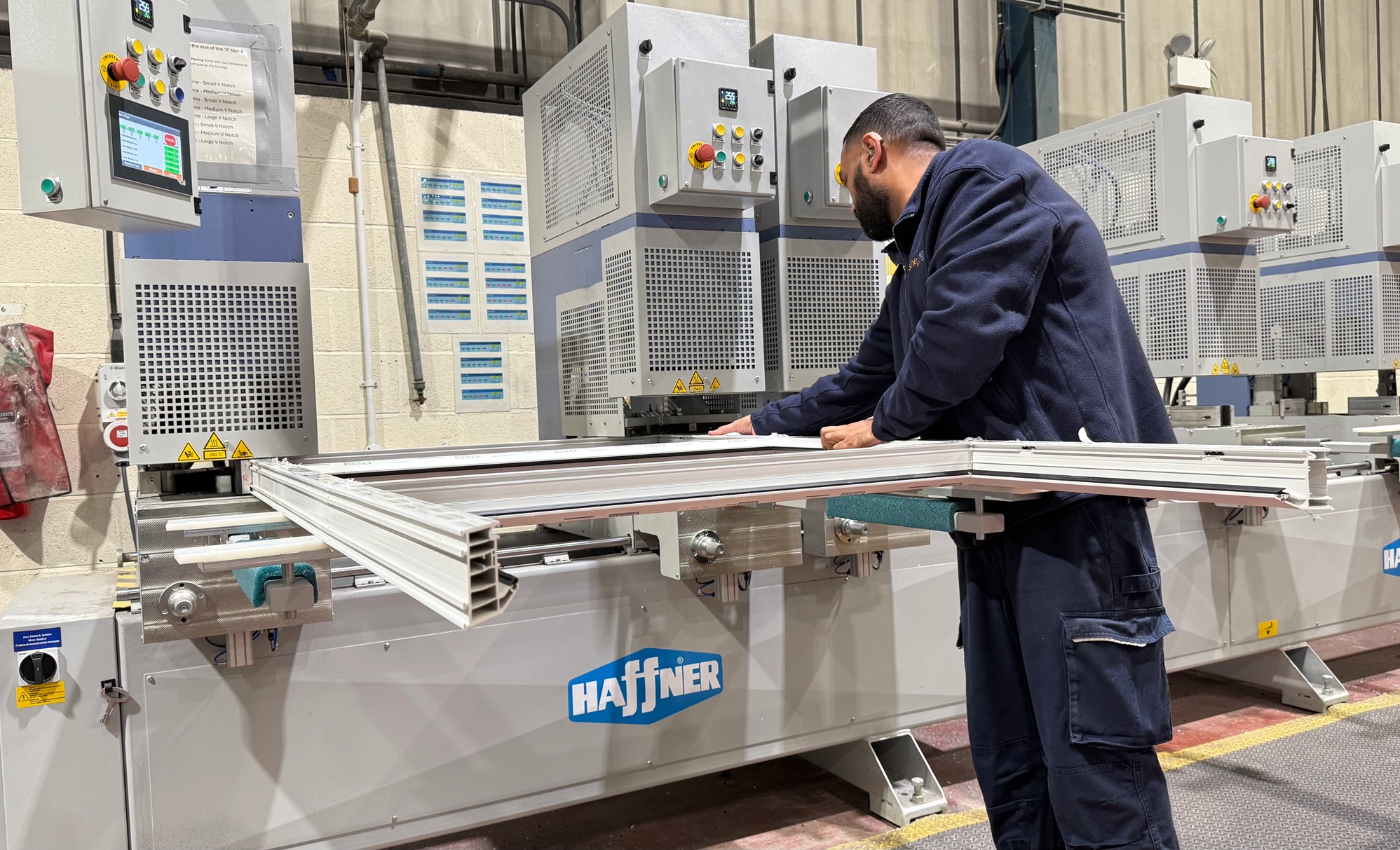 Fenestration marketing agency supporting window manufacturer production line with PVCu profile fabrication machinery